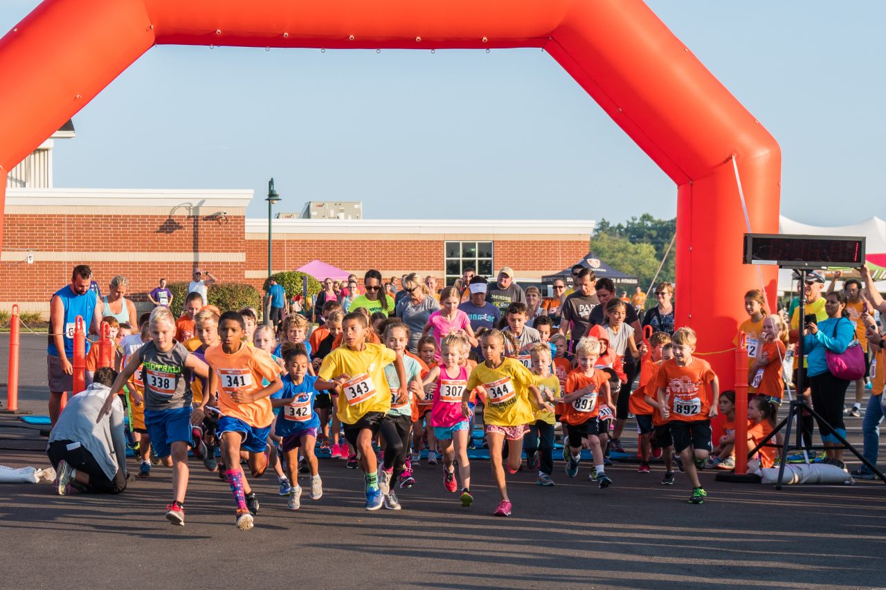 Kids dashing in the Fun Run